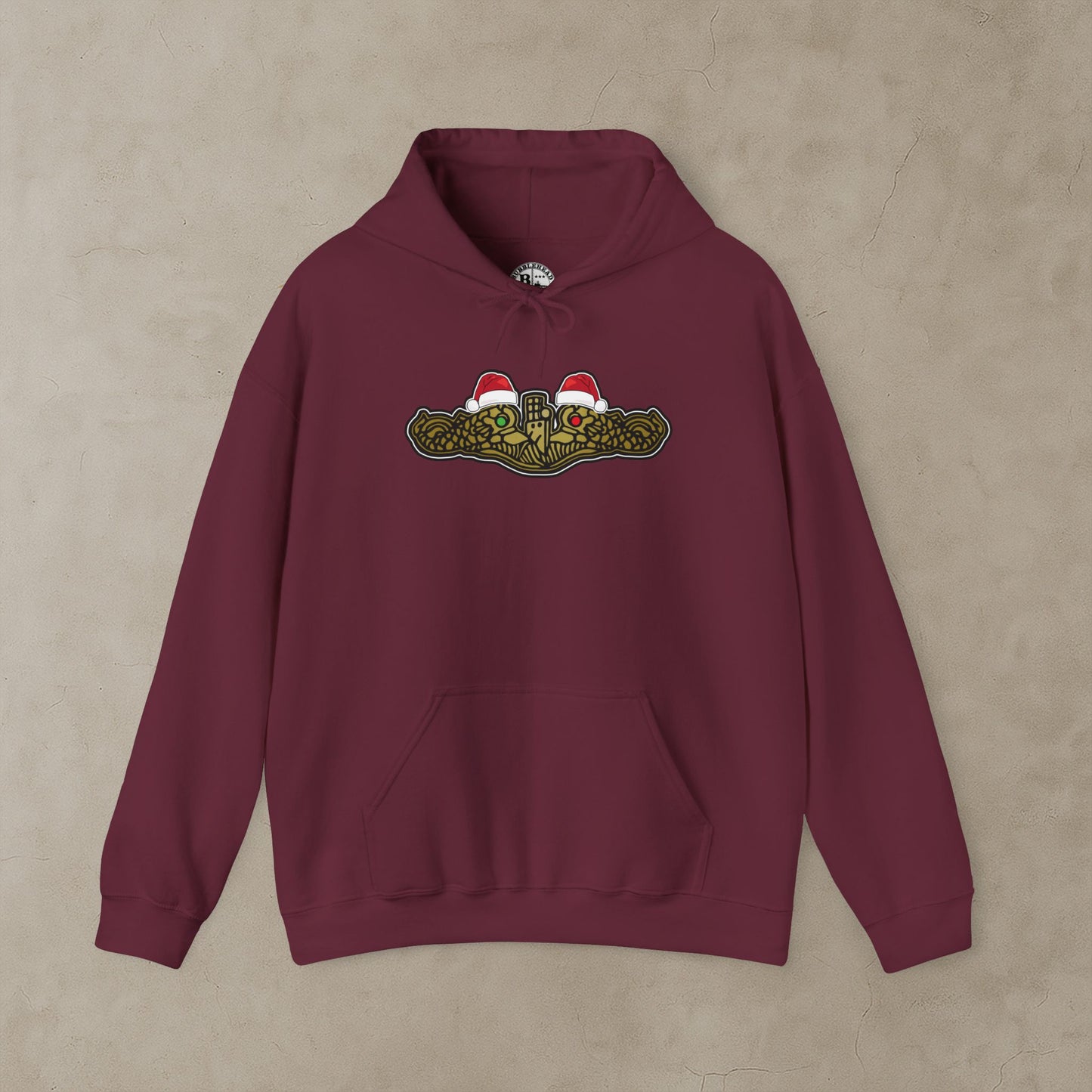 United States Submarine Force Gold Dolphins Christmas Hats with Red and Green Eyes Unisex Heavy Blend™ Hooded Sweatshirt