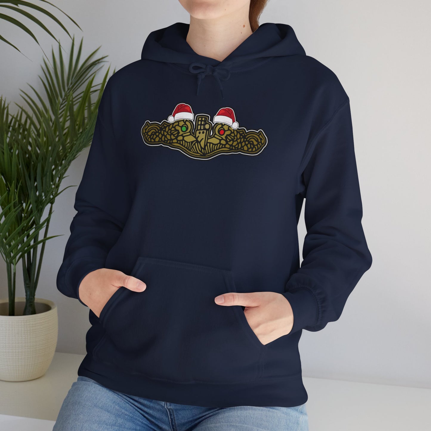 United States Submarine Force Gold Dolphins Christmas Hats with Red and Green Eyes Unisex Heavy Blend™ Hooded Sweatshirt