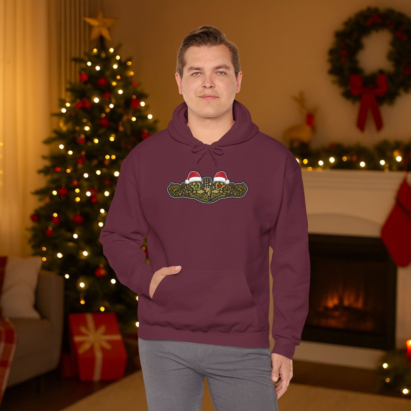 United States Submarine Force Gold Dolphins Christmas Hats with Red and Green Eyes Unisex Heavy Blend™ Hooded Sweatshirt