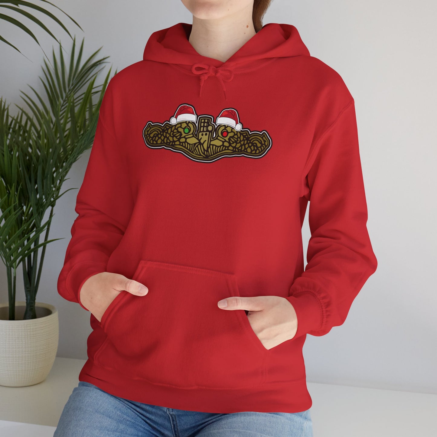 United States Submarine Force Gold Dolphins Christmas Hats with Red and Green Eyes Unisex Heavy Blend™ Hooded Sweatshirt